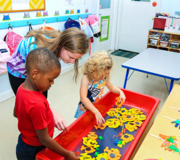 Smiling preschooler during craft time